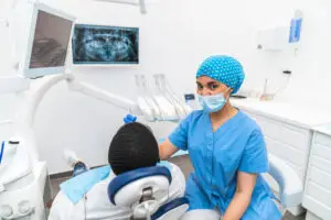 Dental hygienist providing care