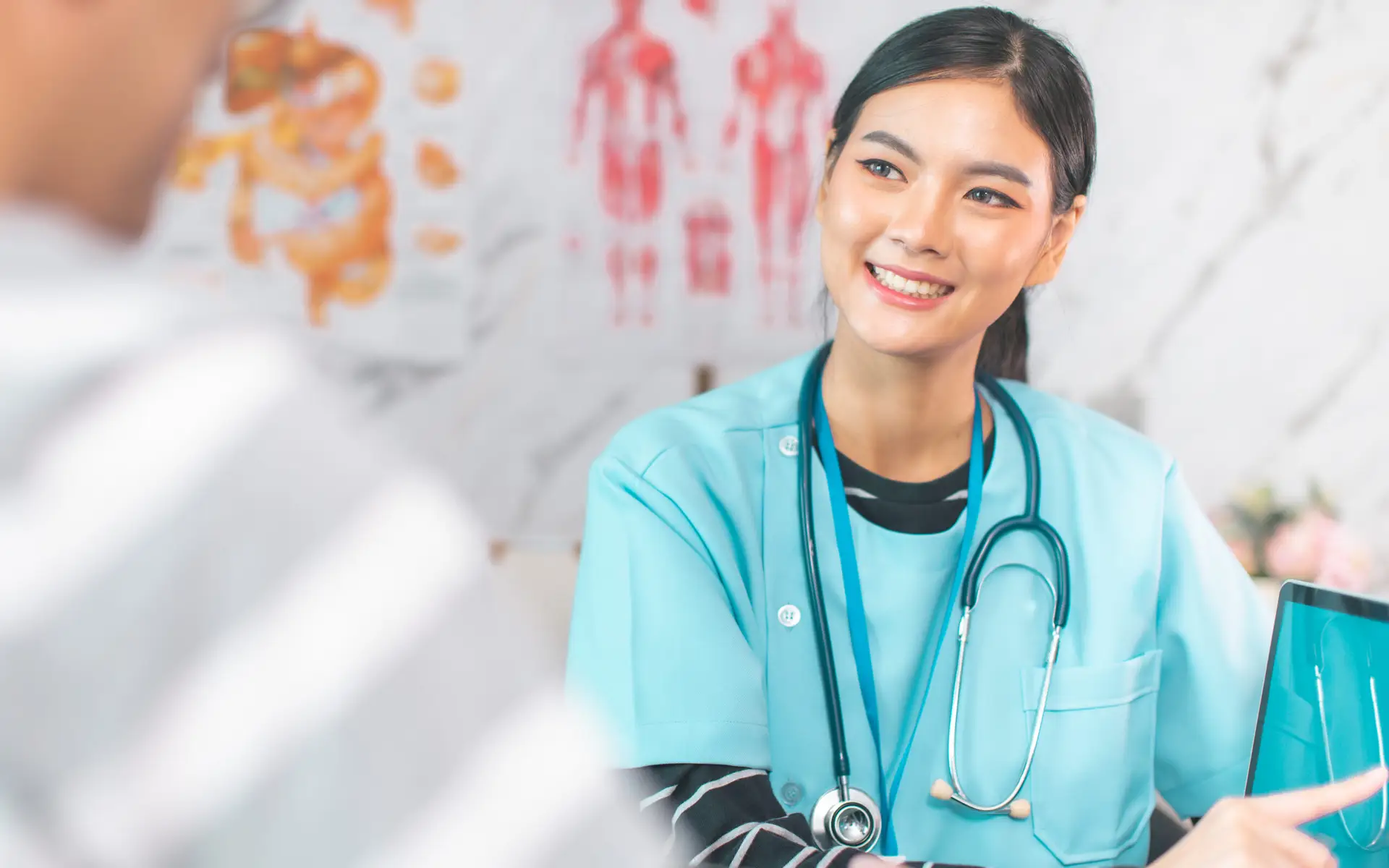 Female doctor smiling at patient